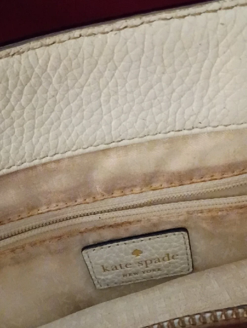 kate spade cream pebble leather tote with tassel